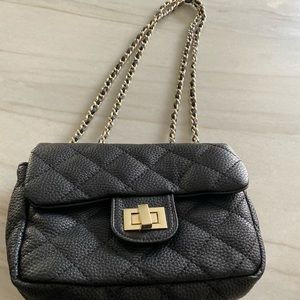 Adorable black quilted purse